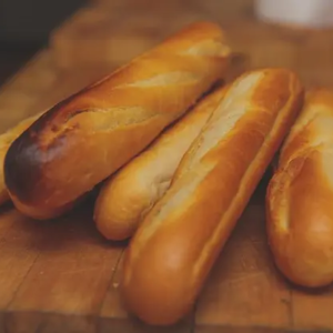 close-up-baguettes-cutting-board_1048944-12453938